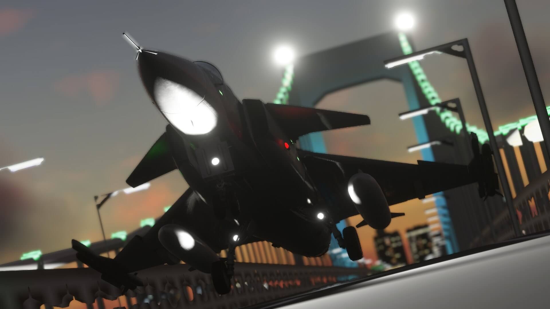 A fighter jet takes off from a city bridge at night