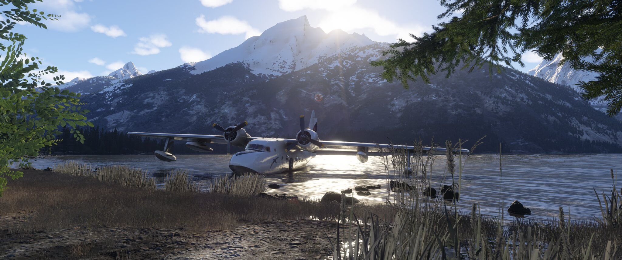A high wing propeller aircraft parked on the water in the middle of a valley