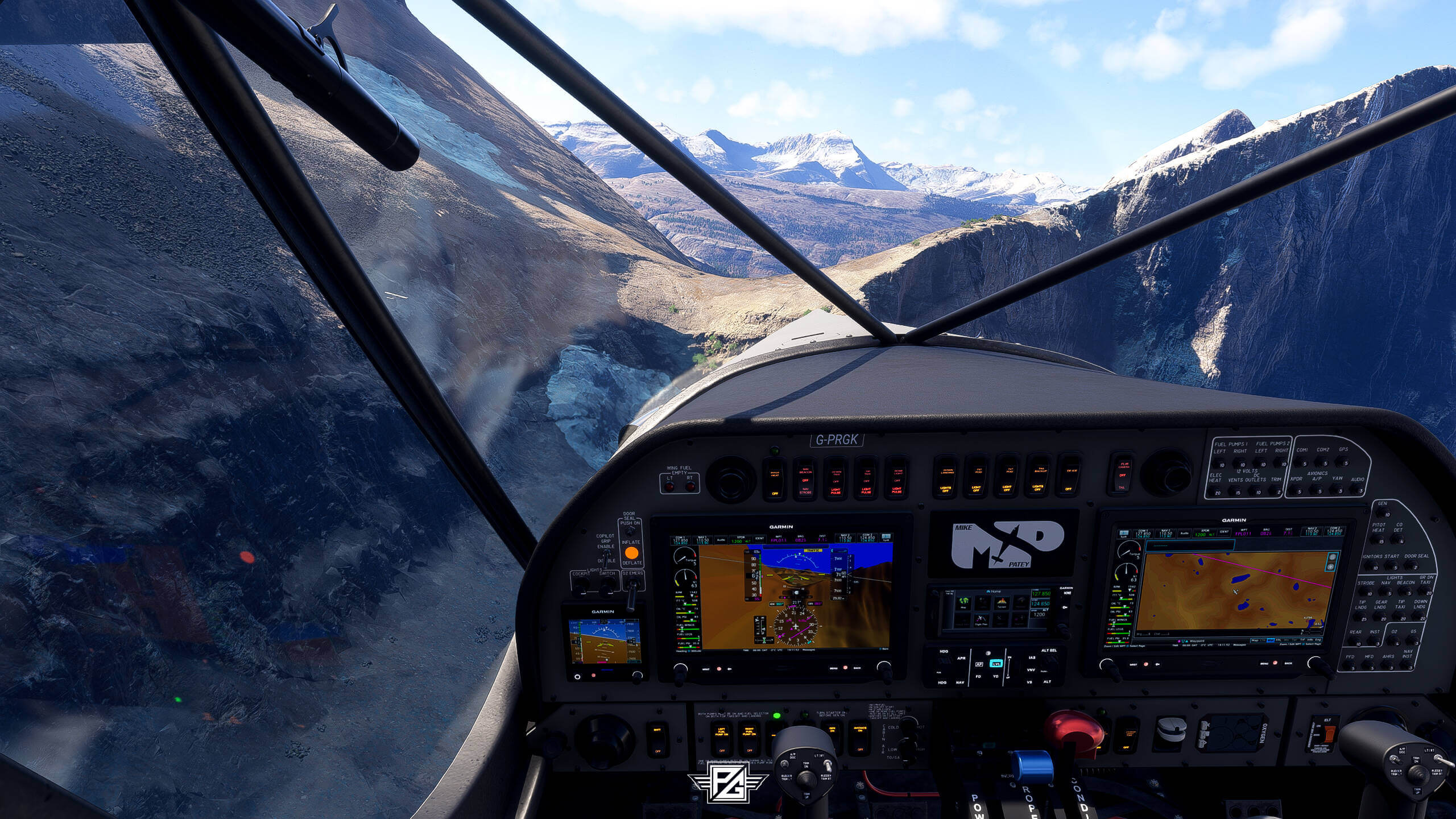A cockpit view of a bush aircraft flying through a valley