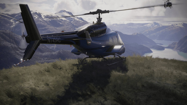 A helicopter parked on the edge of a cliff face with another helicopter hovering nearby