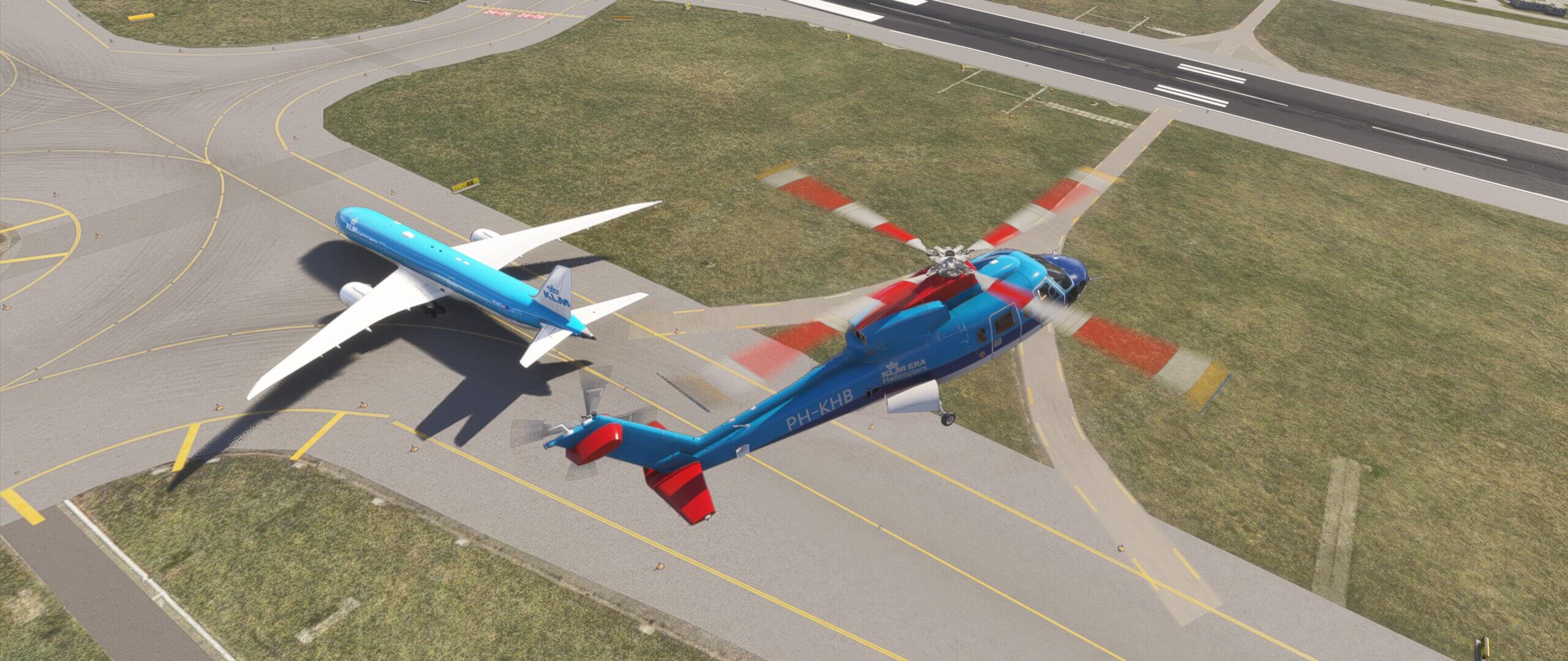 A KLM helicopter flies over a KLM Boeing 777, taxiing at Amsterdam Schipol airport