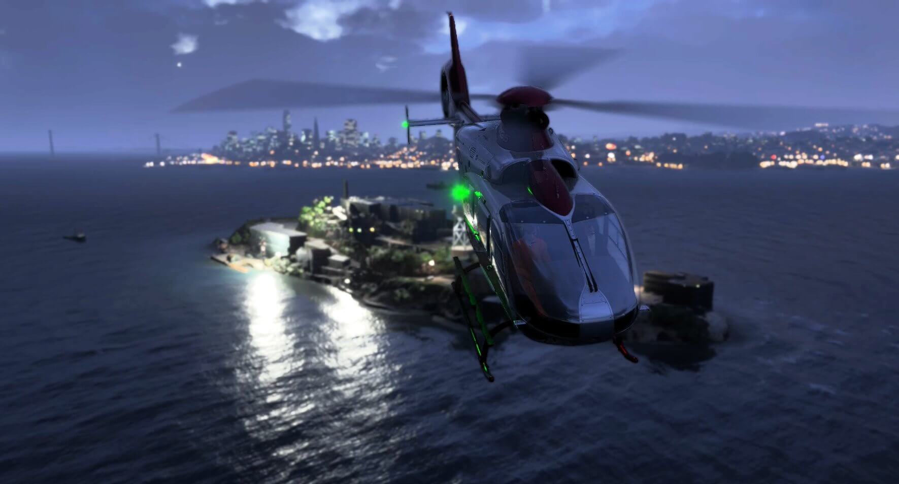 A EC135 helicopter flies over Alcatraz, San Francisco