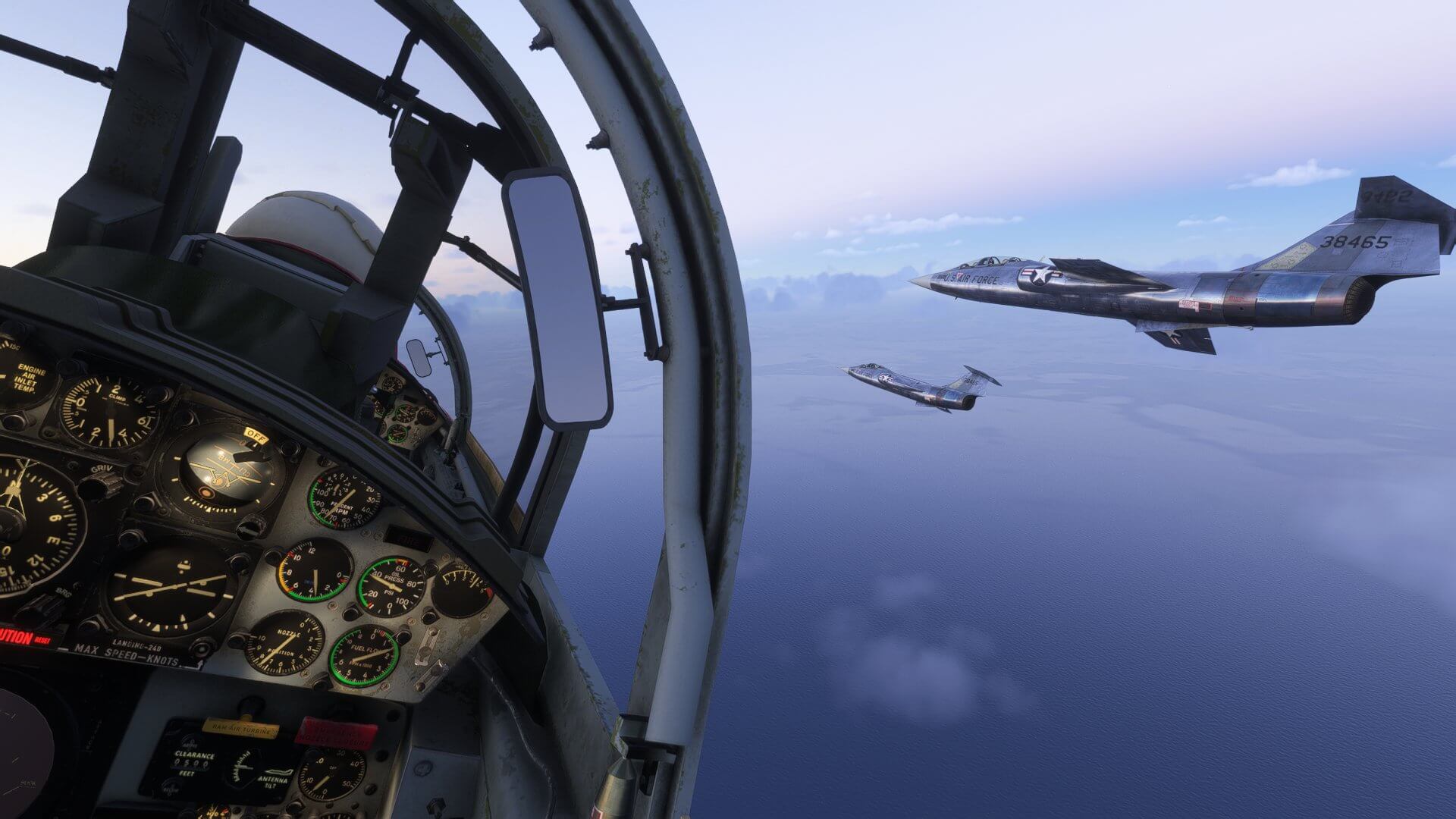 The view from the backseat of a fighter aircraft flying in close formation