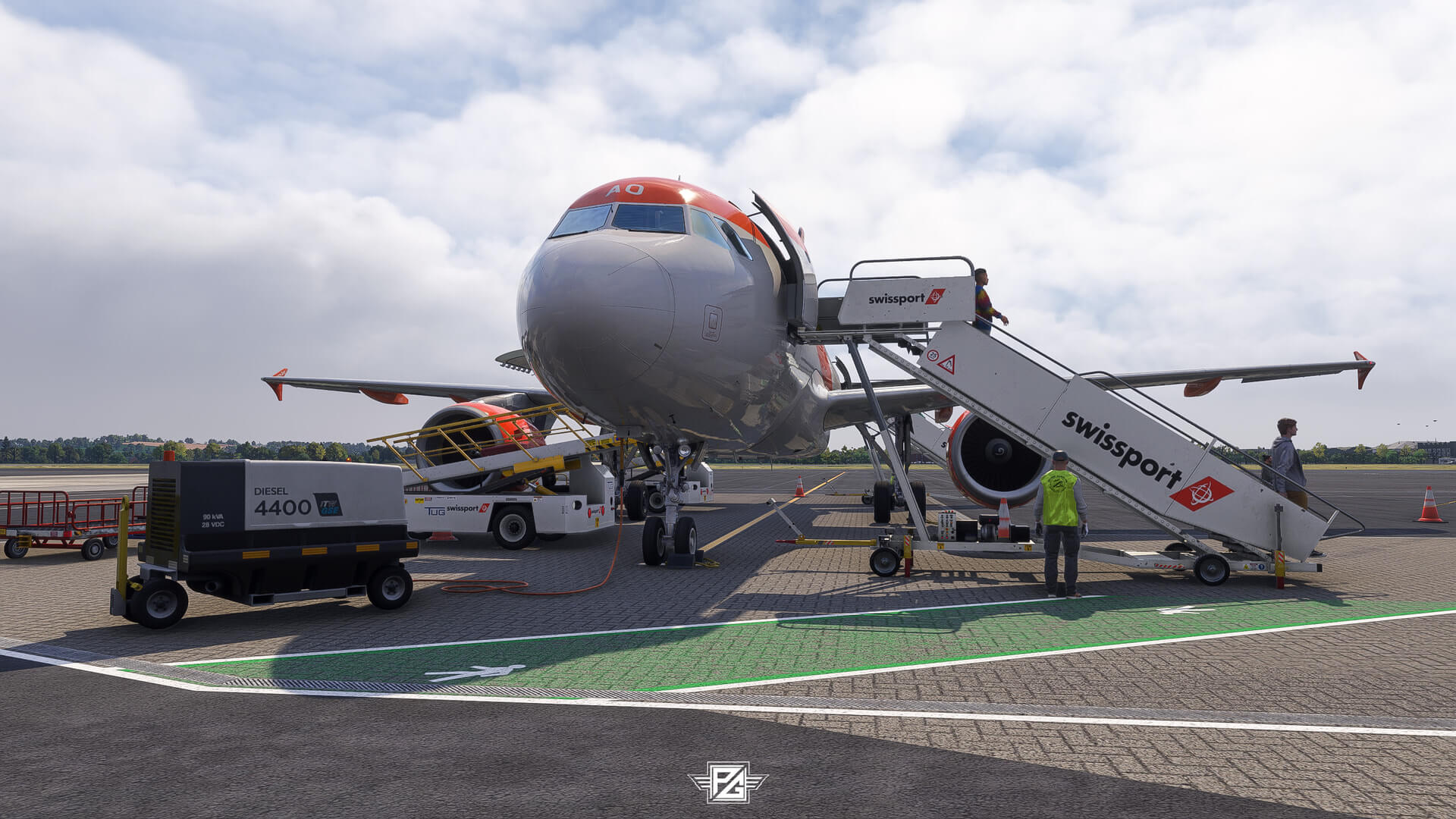 An Airbus A320 parked on the ramp with ground equipment attached