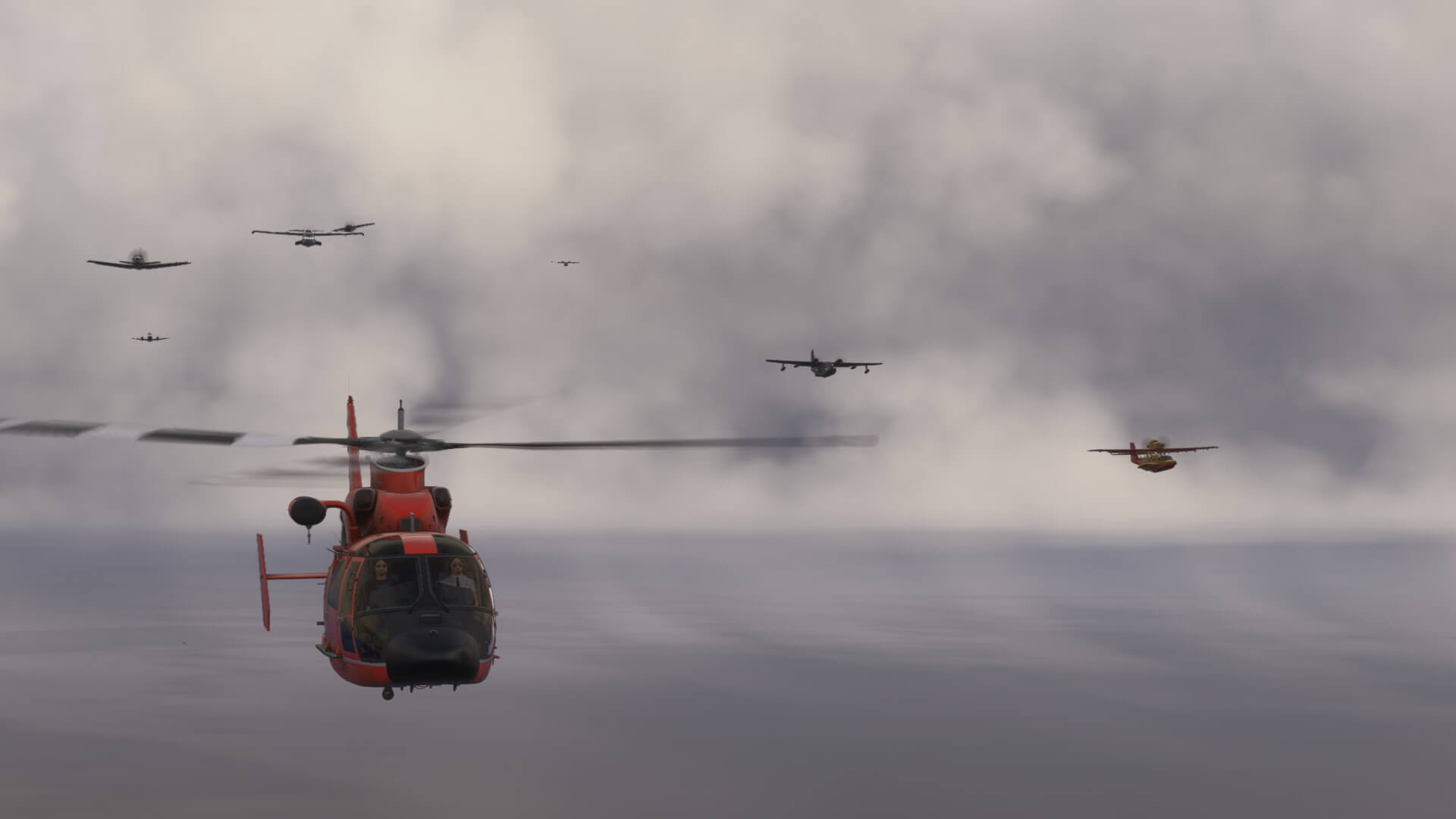 A group of aircraft fly in close formation below overcast clouds