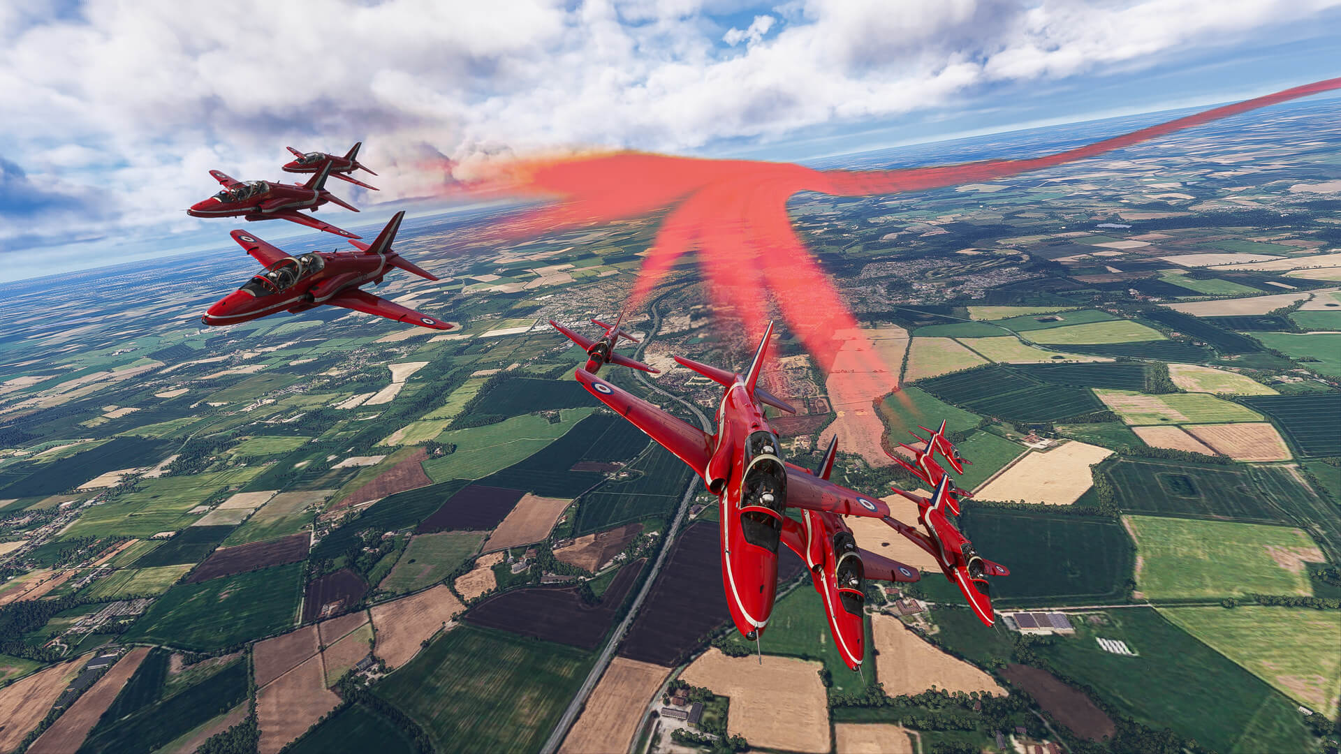 The Red Arrows bank left in formation with red smoke turned on