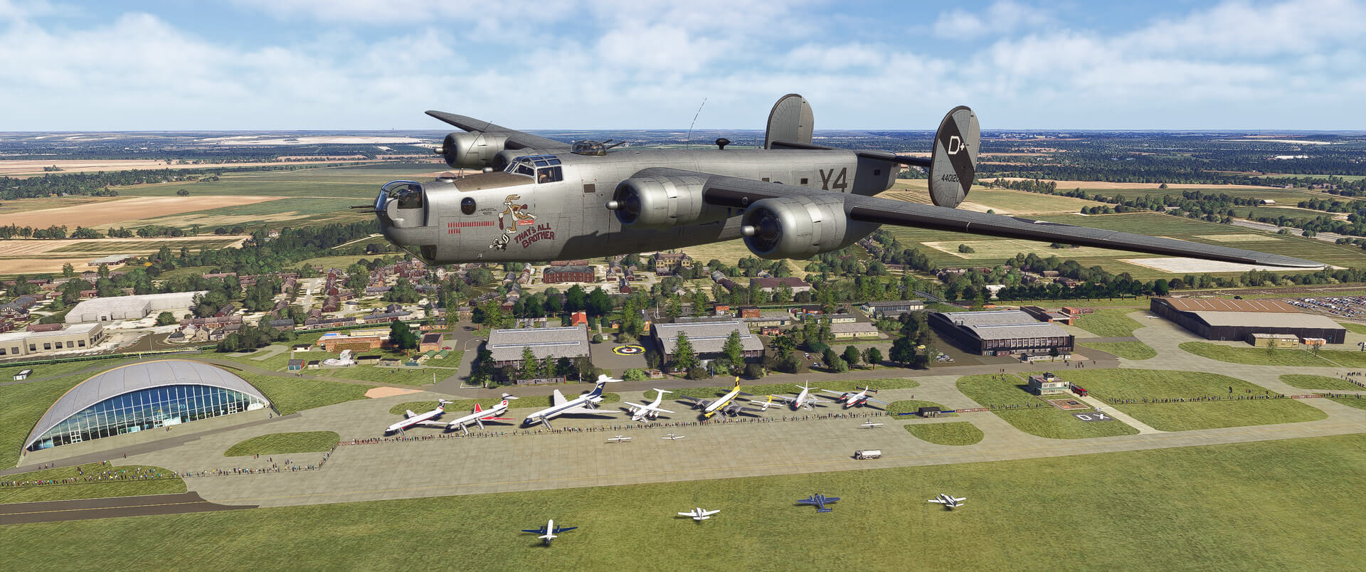 A WW2 bomber aircraft flies over Duxford aerodrome during an airshow