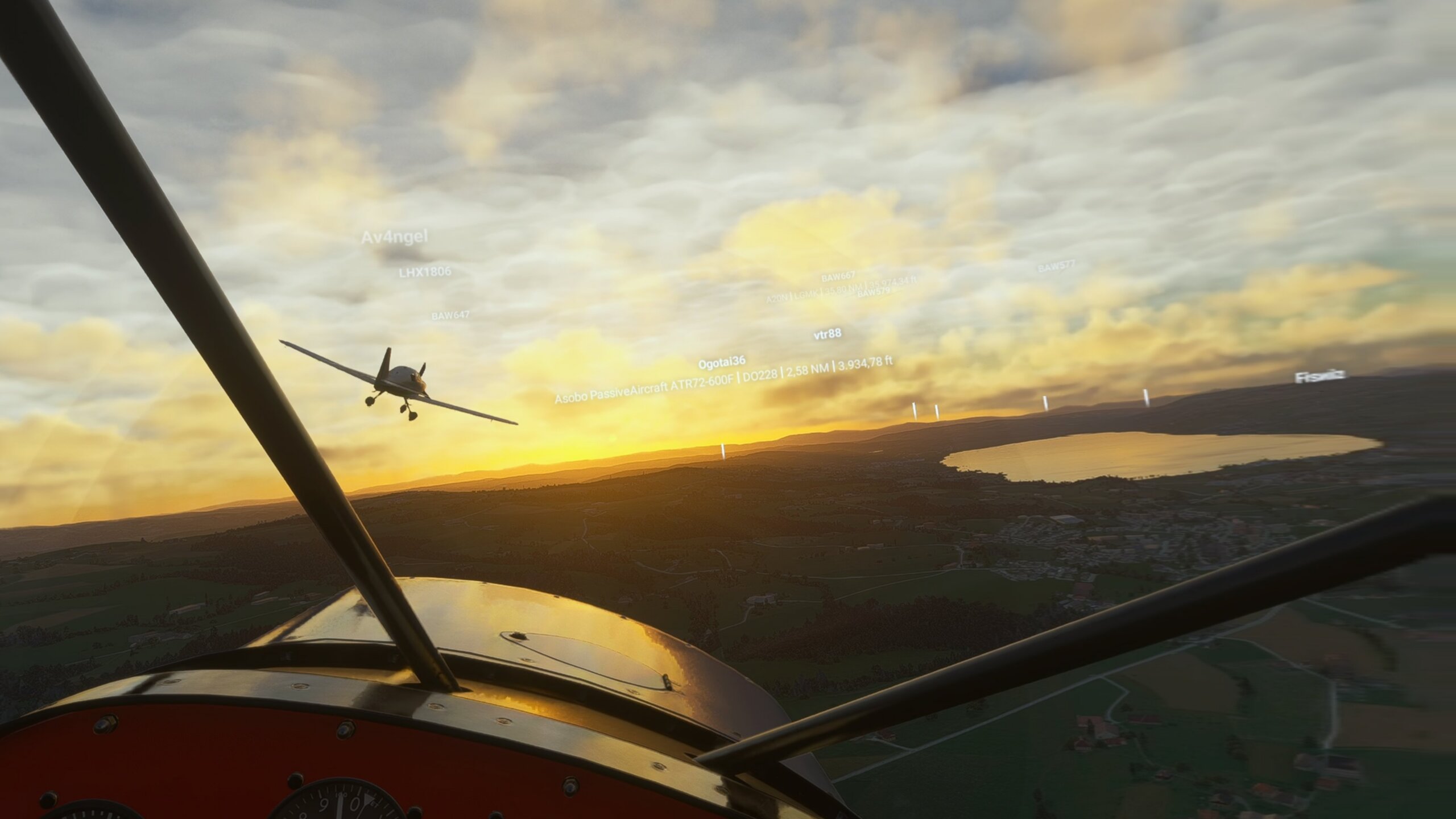 cockpit view of a group flight during sunset