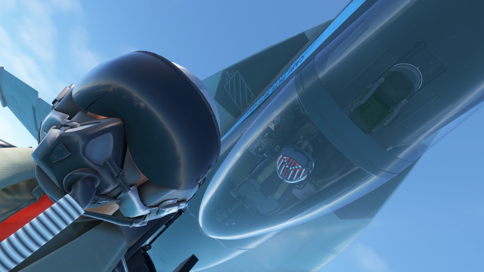 Maverick in his F/A-18 Hornet roles inverted above another fighter pilot