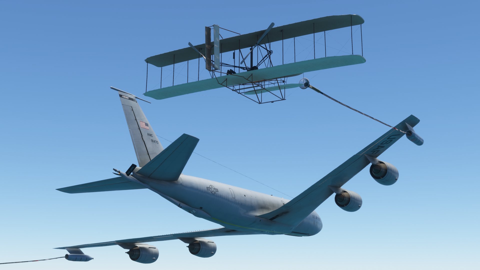The Wright Flyer flies in close formation with a KC-135 aerial refuelling aircraft