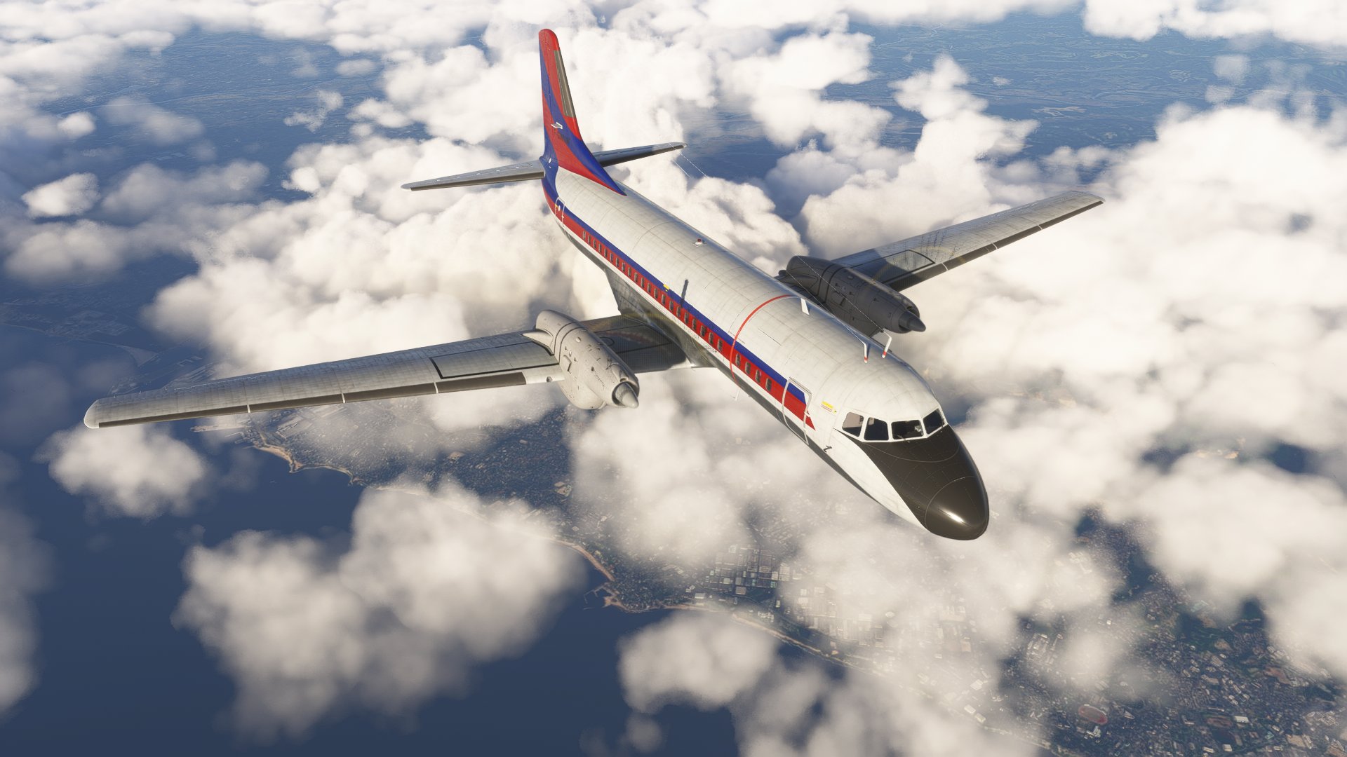 A YAS-11 in flight above clouds