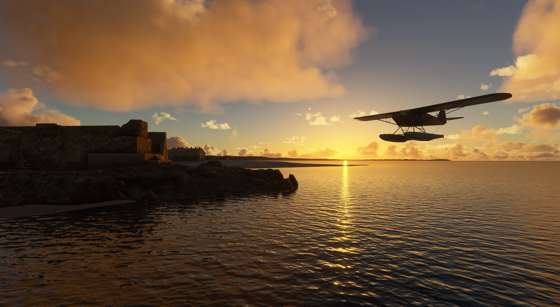 Silhouette of a high wing propeller aircraft over water during sunset