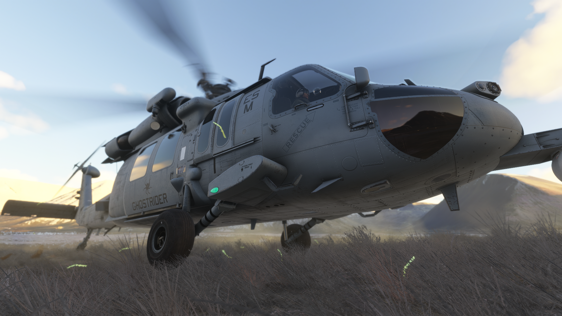 A close up view of a helicopter lifting for departure
