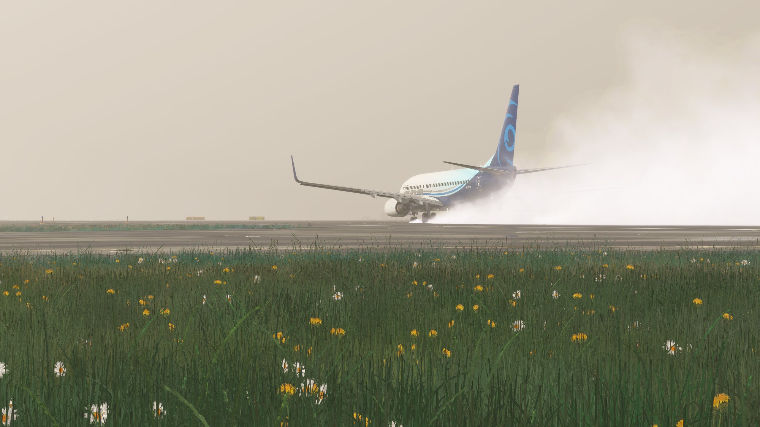 A Boeing 737 kicks up water as it applies takeoff power