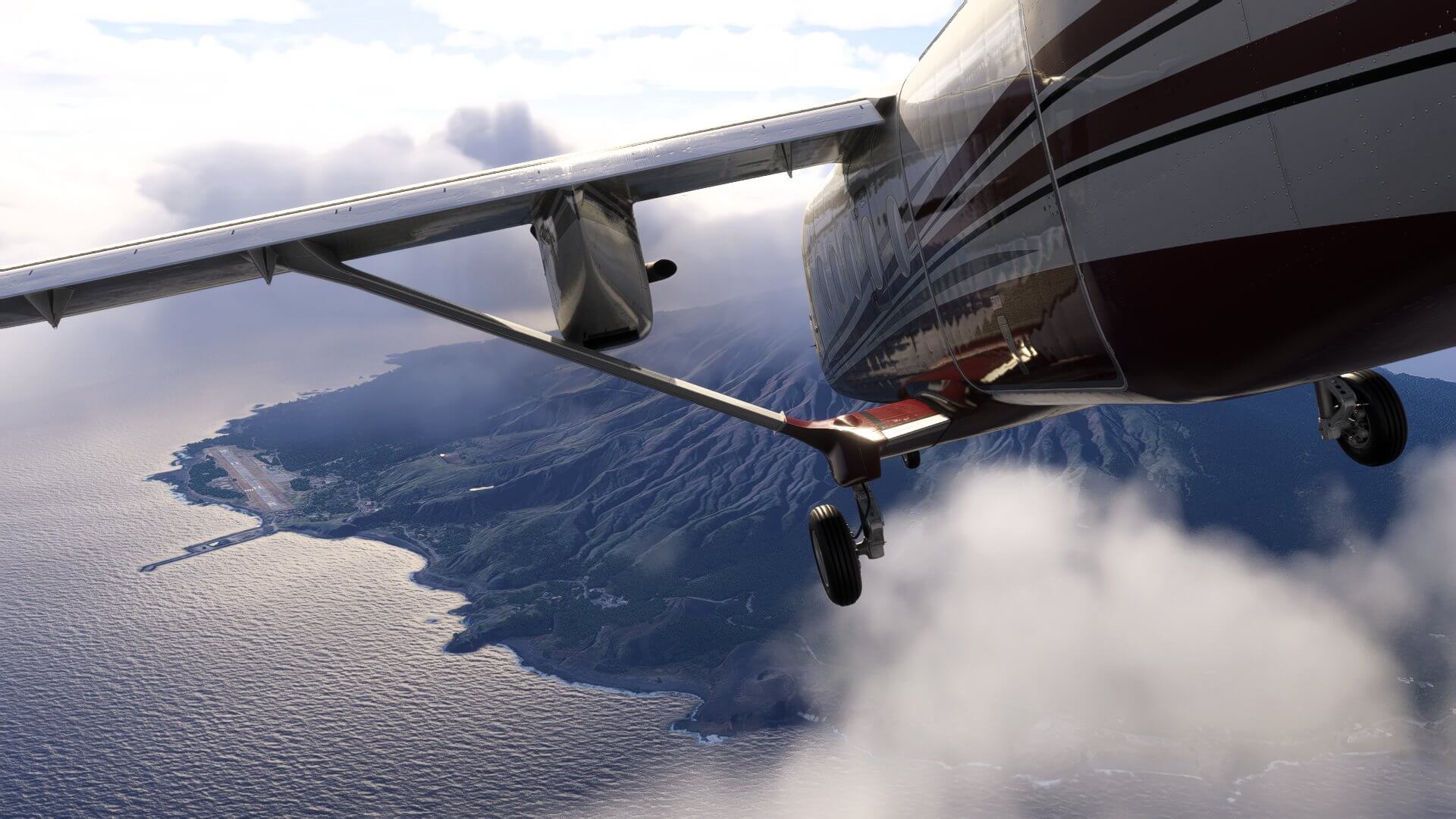 A high wing propeller aircraft conducting a steep approach to an island runway