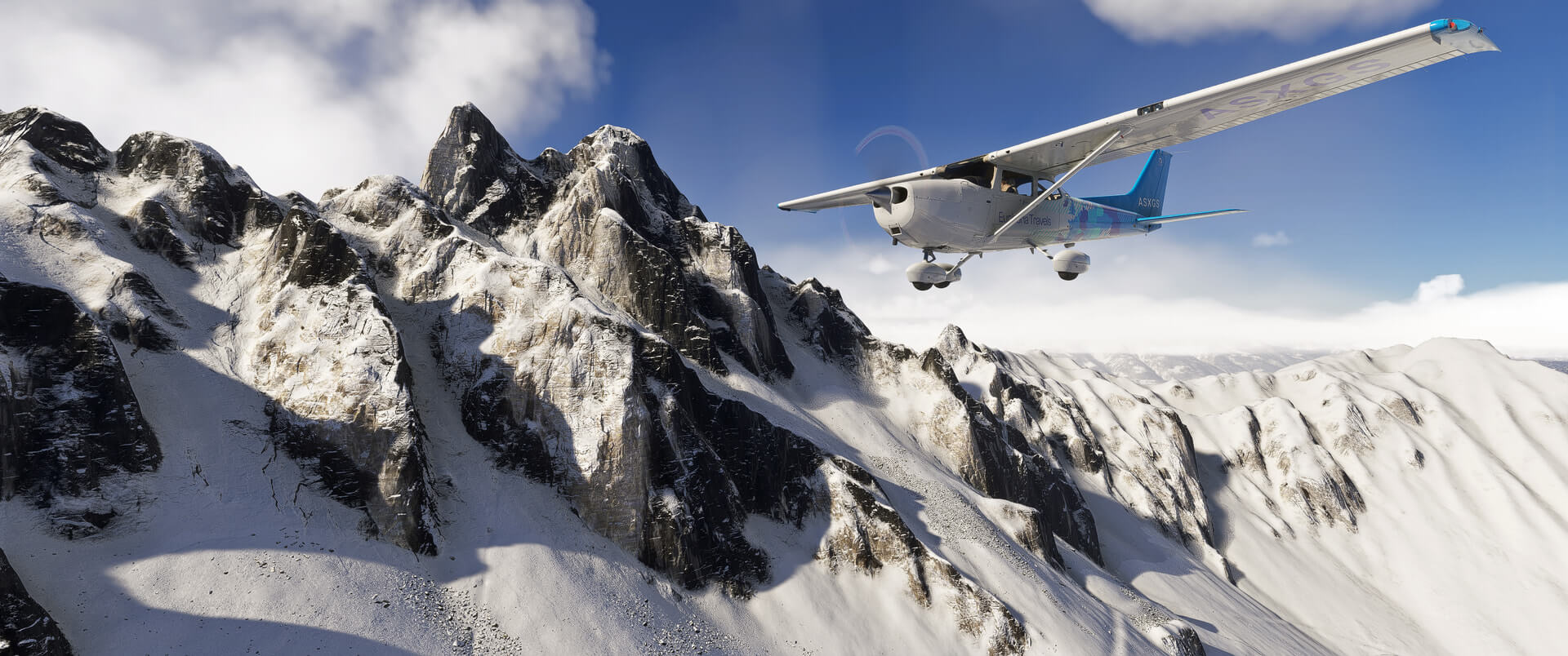 A Cessna 172 flies near snowy mountains