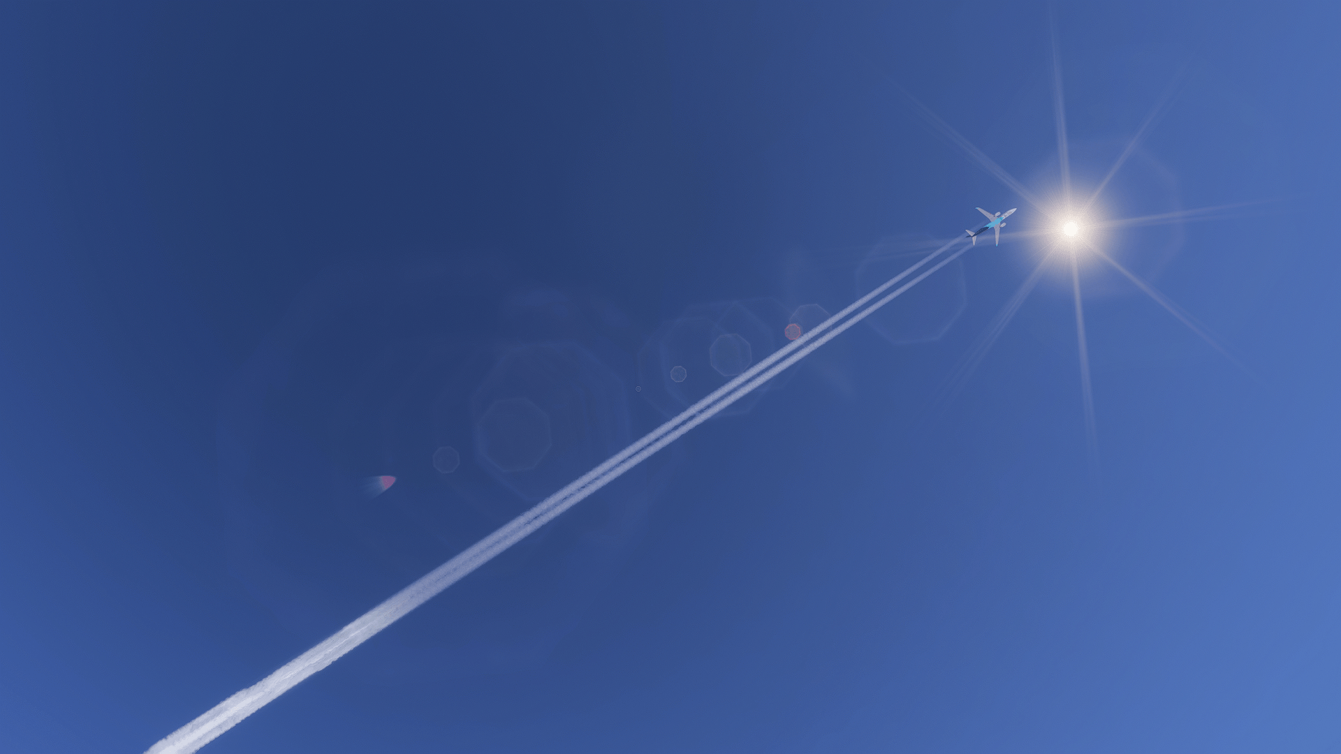 An airbus high in cruise with contrails behind